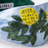Hand-beaded lemon embroidered headband with green beadwork on soft blue satin base