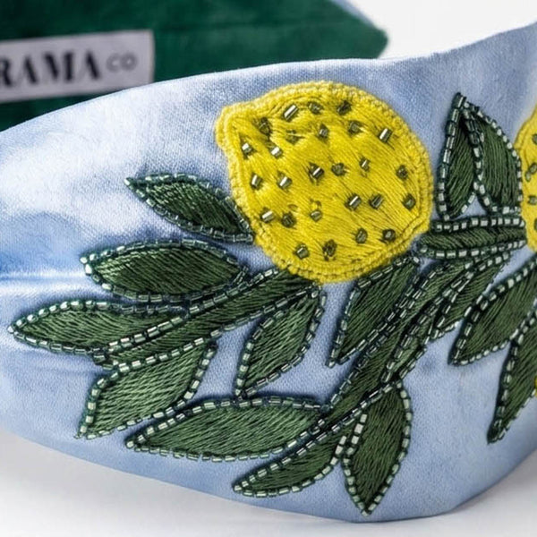 Hand-beaded lemon embroidered headband with green beadwork on soft blue satin base