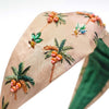 Tropical embroidered headband styled for beachy waves, ponytails, and open hair - palm tree design