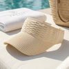 Effortlessly glam ribbed visor with oversized shades and beachy waves - on-holiday sun cap