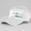 White cap with green fish designs on a gray background