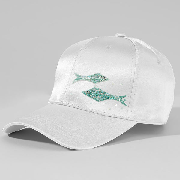 White satin sun cap with detailed blue sardine embroidery for a fresh vacation-ready vibe