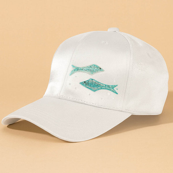 Resort-inspired white baseball cap adorned with embroidered sardines and ocean charm