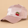 Cherry embroidered pink cap - playful beach hat for vacation vibes and airport style