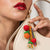Fruit-themed bag charm with glossy beaded details and metal loop for bags, hats and keys