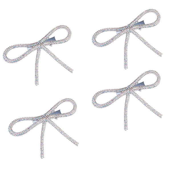 Four decorative bows with rhinestone embellishments on a white background