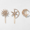 Three decorative hair pins with star, moon, and diamond design on a light gray background