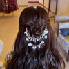 Hair with decorative accessories in a room setting