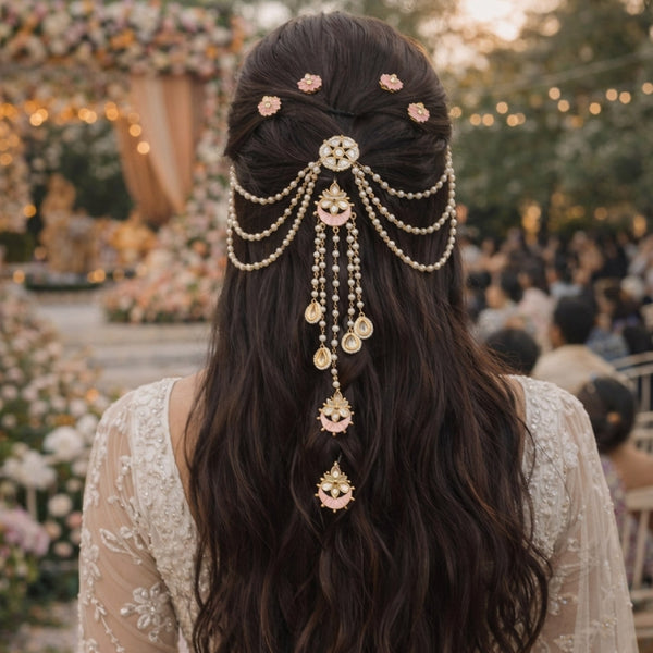 Woman with elaborate hair jewelry at a festive outdoor event