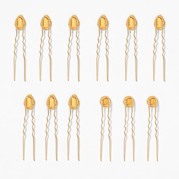 Crystal U-pins in warm yellow and cool silver stacked together for maximum hair sparkle