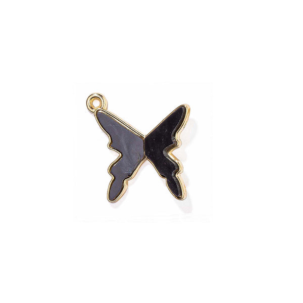 Butterfly-shaped pendant with gold outline and black wings on a white background