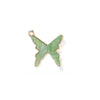 Green butterfly-shaped pendant with gold outline on a white background