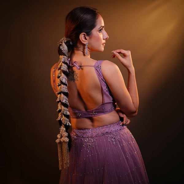 Hand-beaded silver bridal parandi with lace and tassel details - statement hair accessory