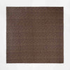 Brown fabric with a subtle pattern on a white background