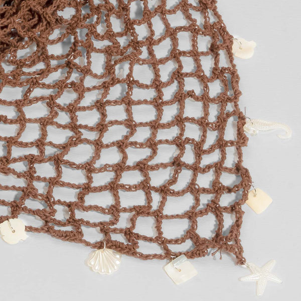 Brown boho crochet headband with dangling shell charms for beach hair and festival outfits