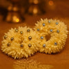 Festive scented gajra hair scrunchie adorned with metallic ghungroos for a graceful ethnic touch