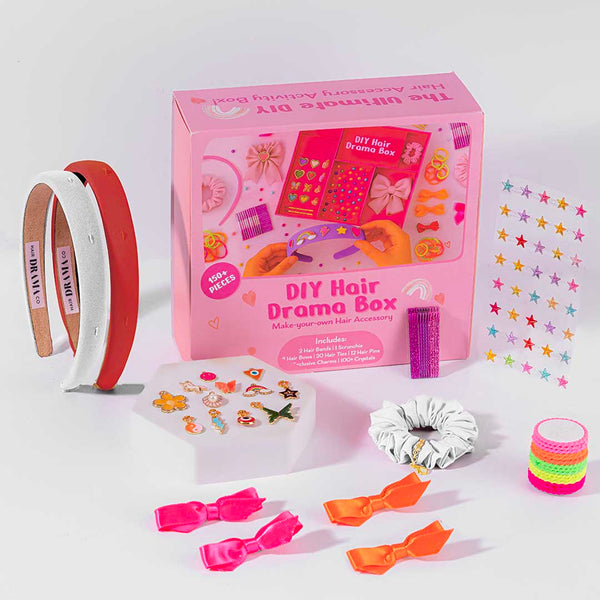 DIY Hair Drama Box with 2 Hair Bands, 1 Scrunchie, 1 Hair Bow, 11 Exclusive Charms, 200+ Crystals & 10 Pom PDIY Hair Drama Box with 2 Hair Bands, 1 Scrunchie, 4 Mini Bows, 20 Hair Ties, 12 Exclusive Charms & 100+ Crystals - Red & White