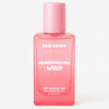 Pink bottle of 'Hair Drama Marshmallow Whip' hair perfume mist on a white background