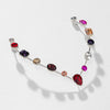 Necklace with multicolored gemstones on a white background