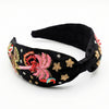 Wearable art tropical bird knotted headband with hand embroidery and crystal details
