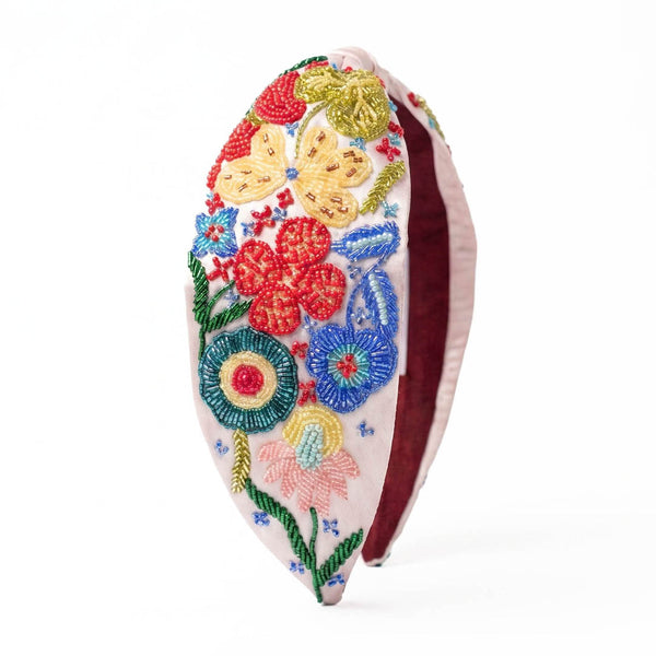 Designer headband with hand-embroidered sequin flowers in vibrant colors 