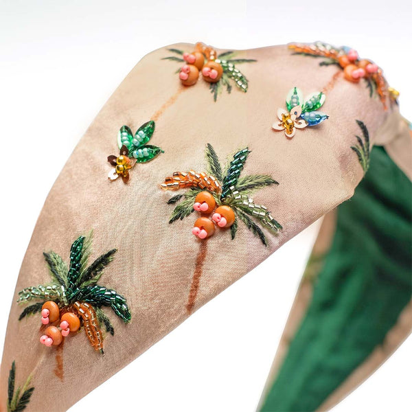 Tropical embroidered headband styled for beachy waves, ponytails, and open hair - palm tree design