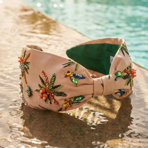 Hand-embroidered tropical headband with beaded palm trees - handcrafted details on soft beige satin