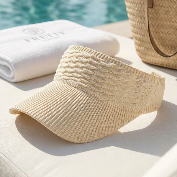 Effortlessly glam ribbed visor with oversized shades and beachy waves - on-holiday sun cap