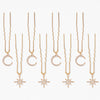 Sparkly star and moon U pins holding festival braid together with subtle celestial hair vibes