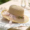 Tan Woven Straw Flat Brim Hat with Removable Bow Ribbon