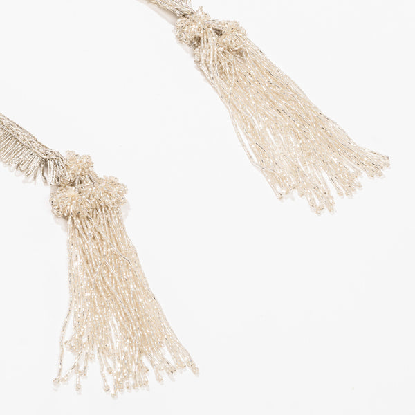 Silver bridal parandi with fuller silhouette - lace, beads, and tassels for defined braids