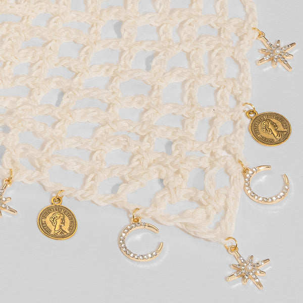 Cream crochet headscarf featuring celestial charm details, versatile bandana for sunny day styling