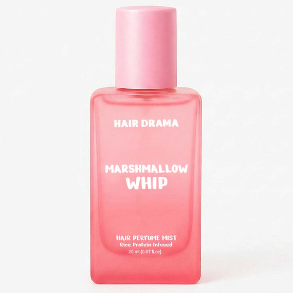 Pink bottle of 'Hair Drama Marshmallow Whip' hair perfume mist on a white background