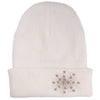 White beanie with decorative emblem on a white background
